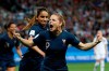 France's Eugenie Le Sommer, celebrates with France's Amel Majri after scoring her side's second goal on a penalty kick during the Women's World Cup Group A soccer match between France and Norway in Nice, France, Wednesday, June 12, 2019. (AP Photo/Claude Paris)