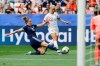 England's Beth Mead, right, and Scotland's Sophie Howard vie for the ball during the Women's World Cup Group D soccer match between England and Scotland in Nice, France, Sunday, June 9, 2019. (AP Photo/Claude Paris)