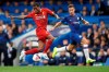 Liverpool's Georginio Wijnaldum, left, and Chelsea's Cesar Azpilicueta compete for the ball during the British premier League soccer match between Chelsea and Liverpool, at the Stamford Bridge Stadium, London, Sunday, Sept. 22, 2019. (AP Photo/Matt Dunham)