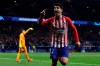 FILE - In this Wednesday, Feb. 20, 2019 file photo, Atletico forward Alvaro Morata reacts after scoring his side's opening goal but the goal was disallowed after a review by VAR during the Champions League round of 16 first leg soccer match between Atletico Madrid and Juventus at Wanda Metropolitano stadium in Madrid. Morata scored twice to give 10-man Atletico Madrid a 2-0 win at Real Sociedad on Sunday, March 3, 2019 and keep alive its hopes of fighting Barcelona for the Spanish league title. (AP Photo/Manu Fernandez, File)