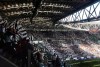 In this Sunday, March 24 2019 photo, spectators watch the Italian league women‚Äôs match between Juventus Women and Fiorentina Women in the Allianz Arena in Turin, Italy. The exceptional growth of women‚Äôs soccer took another leap forward when 39,000 people packed into the Allianz Stadium to watch Juventus Women beat Fiorentina Women 1-0 on a sunny Sunday afternoon. That was a record attendance in Italy that far eclipsed the old mark of 14,000. (AP Photo/Daniella Matar)