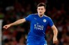 FILE - In this Friday, Aug. 11, 2017 file photo, Leicester City's Harry Maguire looks to pass the ball during their English Premier League soccer match between Arsenal and Leicester City at the Emirates stadium in London. A person with knowledge of the deal says Manchester United is set to break the world transfer record for a defender after agreeing to pay 80 million pounds ($97 million) to sign Harry Maguire from Leicester. The person spoke on condition of anonymity because the transfer is yet to be finalized. (AP Photo/Alastair Grant, File)