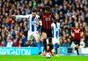 Brighton's Davy Propper, left, vies for the ball with Huddersfield Town's Philip Billing, during the English Premier League soccer match between Brighton and Huddersfield Town, at the AMEX Stadium, in Brighton, England, Saturday, March 2, 2019. (Gareth Fuller/PA via AP)