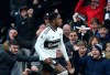 Fulham's Ryan Sessegnon celebrates scoring his side's first goal of the game during the English Premier League soccer match between Fulham and Wolverhampton Wanderers, at Craven Cottage, in London, Wednesday, Dec. 26, 2018. (Steven Paston/PA via AP)