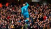 Watford goalkeeper Heurelho Gomes celebrates after teammate Etienne Capoue scores his side's first goal of the game during the FA Cup quarter final soccer match between Watford and Crystal Palace , at Vicarage Road, in Watford, England, Saturday March 16, 2019. (Jonathan Brady/PA via AP)