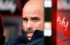 Manchester City manager Pep Guardiola gestures, prior to the start of the English Premier League soccer match between Bournemouth and Manchester City, at the Vitality Stadium, in Bournemouth, England, Saturday March 2, 2019. (Adam Davy/PA via AP)