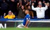 Everton's Richarlison celebrates scoring his side's first goal of the game, during the English Premier League soccer match between Everton and Chelsea at Goodison Park in Liverpool, England, Sunday March 17, 2019. (Martin Rickett/PA via AP)