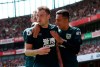 Burnley's Ashley Barnes, foreground, celebrates scoring his side's first goal of the game with teammates, during the English Premier League soccer match between Arsenal and Burnley FC, at The Emirates Stadium, in London, Saturday, Aug. 17, 2019. (Yui Mok/PA via AP)