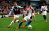 Burnley's Jeff Hendrick, left, and Crystal Palace's Patrick van Aanholt battle for the ball, during the English Premier League soccer match between Burnley and Crystal Palace, at Turf Moor, in Burnley, England, Saturday, March 2, 2019. (Nigel French/PA via AP)