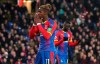 Crystal Palace's Wilfried Zaha reacts, during the English Premier League soccer match between Crystal Palace and Cardiff City at Selhurst Park, in London, Wednesday Dec. 26, 2018. (Yui Mok/PA via AP)