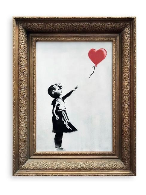 Banksy piece shreds itself after selling for record price