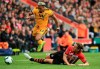Southampton's Jannik Vestergaard, right, tackles Wolverhampton Wanderers' Adama Traore, during the English Premier League soccer match between Southampton and Wolverhampton Wanderers, at St Mary's Stadium, in Southampton, England, Saturday April 13, 2019. (Mark Kerton/PA via AP)