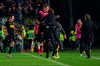 Inter's Romelu Lukaku jubilates and hugs Inter's head coach Antonio Conte after scoring during the Italian Serie A soccer match Brescia and Inter FC, at Rigamonti stadium in Brescia, Italy, Tuesday, Oct. 29, 2019. (Filippo Venezia/ANSA via AP)