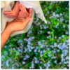 In this undated photo made available on Sunday, May 12, 2019 by @SussexRoyal, Meghan the Duchess of Sussex holds the feet of her baby, Archie Harrison Mountbatten-Windsor. Prince Harry and Meghan, the Duchess of Sussex, have released a photo of their newborn baby to mark Meghan‚Äôs first Mother‚Äôs Day as a mom. The image posted on Instagram shows her hand cradling the feet of Archie Harrison Mountbatten-Windsor, who was born on Monday, against a bed of spring flowers. (@SussexRoyal via AP)