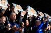 Leicester City fans in the stands hold up banners in honour of late chairman Vichai Srivaddhanaprabha during the English Premier League soccer match between Leicester City and Bournemouth at the King Power Stadium, in Leicester, England, Saturday March 30, 2019. (Mike Egerton/PA via AP)
