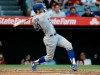 Los Angeles Dodgers' Chris Taylor hits a double to score Corey Seager and Russell Martin during the second inning of a baseball game against the Los Angeles Angels in Anaheim, Calif., Monday, June 10, 2019. (AP Photo/Alex Gallardo)