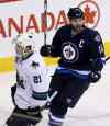 TREVOR HAGAN / THE CANADIAN PRESS FILES
Winnipeg Jets' Andrew Ladd (16)  celebrates after scoring on San Jose Sharks' goaltender Antti Niemi during the first period of NHL hockey action in Winnipeg.
