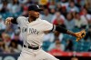 New York Yankees starting pitcher Domingo German throws against the Los Angeles Angels during the first inning of a baseball game in Anaheim, Calif., Tuesday, April 23, 2019. (AP Photo/Chris Carlson)