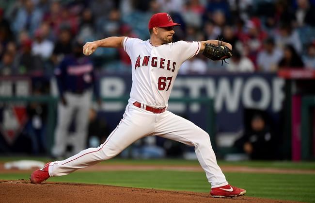 CORRECTS TO STARTING PITCHER NOT RELIEF PITCHER - Los Angeles Angels starting pitcher Taylor Cole throws to the plate during the first inning of a baseball game against the Minnesota Twins, Monday, May 20, 2019, in Anaheim, Calif. (AP Photo/Mark J. Terrill)