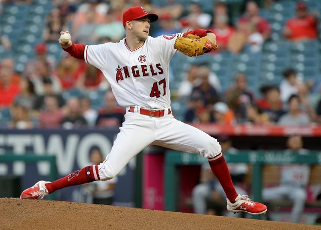 Los Angeles Angels starting pitcher Griffin Canning throws to a Detroit Tigers batter during the first inning of a baseball game in Anaheim, Calif., Tuesday, July 30, 2019. (AP Photo/Alex Gallardo)
