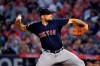 Boston Red Sox starting pitcher Nathan Eovaldi throws to the plate during the first inning of a baseball game against the Los Angeles Angels, Friday, Aug. 30, 2019, in Anaheim, Calif. (AP Photo/Mark J. Terrill)