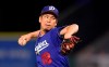 Los Angeles Dodgers starting pitcher Kenta Maeda, of Japan, throws to the plate during the first inning of a preseason baseball game against the Los Angeles Angels Monday, March 25, 2019, in Anaheim, Calif. (AP Photo/Mark J. Terrill)