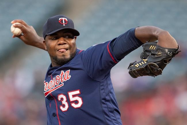 Minnesota Twins starting pitcher Michael Pineda delivers a pitch during the first inning of a baseball game against the Los Angeles Angels in Anaheim, Calif., Tuesday, May 21, 2019. (AP Photo/Kyusung Gong)