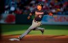 Minnesota Twins' Jorge Polanco rounds second on a single by Willians Astudillo during the first inning of a baseball game against the Los Angeles Angels, Monday, May 20, 2019, in Anaheim, Calif. (AP Photo/Mark J. Terrill)
