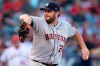 Houston Astros starting pitcher Wade Miley winds up during the second inning of the team's baseball game against the Los Angeles Angels in Anaheim, Calif., Thursday, July 18, 2019. (AP Photo/Kyusung Gong)