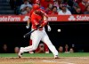 Los Angeles Angels' Andrelton Simmons hits a solo home run against the New York Yankees during the first inning of a baseball game Wednesday, April 24, 2019, in Anaheim, Calif. (AP Photo/Marcio Jose Sanchez)