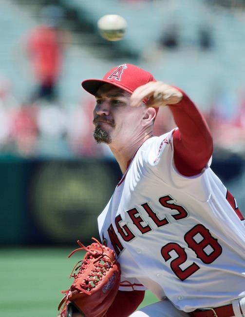 Los Angeles Angels starting pitcher Andrew Heaney throws to the plate during the first inning of a baseball game against the Oakland Athletics Sunday, June 30, 2019, in Anaheim, Calif. (AP Photo/Mark J. Terrill)