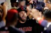 Cleveland Indians' Jason Kipnis celebrates in the dugout after a two-run home run against the Los Angeles Angels during the second inning of a baseball game in Anaheim, Calif., Monday, Sept. 9, 2019. (AP Photo/Chris Carlson)