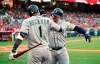 Seattle Mariners' Daniel Vogelbach, right, is congratulated by Tim Beckham after hitting a solo home run during the first inning of a baseball game against the Los Angeles Angels Saturday, April 20, 2019, in Anaheim, Calif. (AP Photo/Mark J. Terrill)
