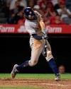 Houston Astros' Jake Marisnick hits an RBI double during the fifth inning of the team's baseball game against the Los Angeles Angels in Anaheim, Calif., Wednesday, July 17, 2019. (AP Photo/Kyusung Gong)
