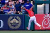 Los Angeles Angels left fielder Justin Upton tries to field a ball hit for an RBI double by Los Angeles Dodgers' Max Muncy during the first inning of a preseason baseball game Sunday, March 24, 2019, in Anaheim, Calif. Upton was injured on the play and was taken out of the game. (AP Photo/Mark J. Terrill)