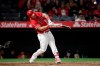Los Angeles Angels' Mike Trout hits a home run during the sixth inning of the team's baseball game against the Texas Rangers, Friday, April 5, 2019, in Anaheim, Calif. (AP Photo/Jae C. Hong)