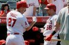 Los Angeles Angels' Kole Calhoun, right, congratulates Mike Trout for Trout's solo home run during the sixth inning of the team's baseball game against the Detroit Tigers in Anaheim, Calif., Wednesday, July 31, 2019. (AP Photo/Alex Gallardo)
