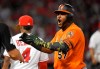 Baltimore Orioles' Hanser Alberto, right, celebrates after hitting a two RBI single as Los Angeles Angels second baseman Luis Rengifo walks away during the eighth inning of a baseball game Saturday, July 27, 2019, in Anaheim, Calif. (AP Photo/Mark J. Terrill)