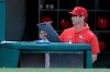 Los Angeles Angels manager Brad Ausmus picks up his clipboard after the last out in the ninth inning as the Houston Astros defeat his team in a baseball game in Anaheim, Calif., Sunday, Sept. 29, 2019. (AP Photo/Alex Gallardo)