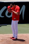 Los Angeles Angels' Shohei Ohtani wipes his face after throwing in the bullpen before a baseball game against the Cincinnati Reds in Anaheim, Calif., Wednesday, June 26, 2019. Ohtani threw off a mound for the first time since Tommy John surgery Oct 1, 2018. (AP Photo/Chris Carlson)