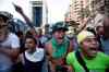 Alejandro Cegarra / The Associated Press
Opposition demonstrators shout slogans against the National Bolivarian Police in Caracas, Venezuela.