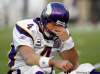 WINSLOW TOWNSON / THE ASSOCIATED PRESS ARCHIVES
Minnesota Vikings quarterback Brett Favre rubs his eyes after being hit by New England Patriots linebacker Gary Guyton during the first quarter last Sunday.