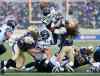 JOHN WOODS / WINNIPEG FREE PRESS
Winnipeg Blue Bombers defender Don Unamba (41) can't stop Toronto Argonauts running back Curtis Steele from flying in for a touchdown during the first half of a CFL pre-season game at Investors Group Field in Winnipeg Monday.