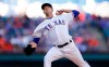 Texas Rangers starting pitcher Drew Smyly throws during the first inning of the team's baseball game against the Houston Astros, Friday, April 19, 2019, in Arlington, Texas. (AP Photo/Brandon Wade)