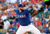 Texas Rangers starting pitcher Lance Lynn works against the Houston Astros during the first inning of a baseball game Thursday, July 11, 2019, in Arlington, Texas. (AP Photo/Jeffrey McWhorter)