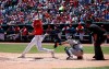 Texas Rangers' Joey GalloÂ hits a triple to drive in two runs as Houston Astros catcher Robinson Chorines and home plate umpire Hunter Wendelstedt look on during the first inning of a baseball game Sunday, April 21, 2019, in Arlington, Texas. (AP Photo/Mike Stone)