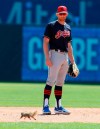 Cleveland Indians second baseman Brad Miller looks on as a squirrel runs across the infield during the second inning of an exhibition baseball game against the Texas Rangers in Arlington,Texas, Tuesday, March 26, 2019. (AP Photo/LM Otero)