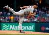 Houston Astros starting pitcher Justin Verlander (35) follows through on his delivery to the Texas Rangers in the first inning of a baseball game in Arlington, Texas, Tuesday, April 2, 2019. (AP Photo/Tony Gutierrez)