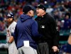 Houston Astros manager AJ Hinch argues with umpire Jeanmar Gomez, right, during the second inning of the team's baseball game against the Texas Rangers in Arlington, Texas, Wednesday, April 3, 2019. Hinch was ejected during the argument. (AP Photo/Tony Gutierrez)