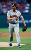 CORRECTS DATE - Houston Astros starting pitcher Gerrit Cole reacts after giving up a hit Texas Rangers' Logan Forsythe to score a fourth run during the first inning of a baseball game Saturday, April 20, 2019, in Arlington, Texas. (AP Photo/Mike Stone)